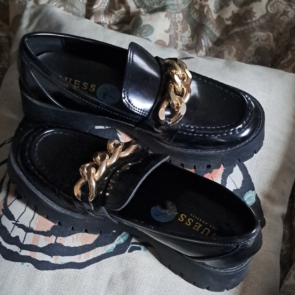 G by Guess Gold and Black Patent Loafers with Chain Detail.